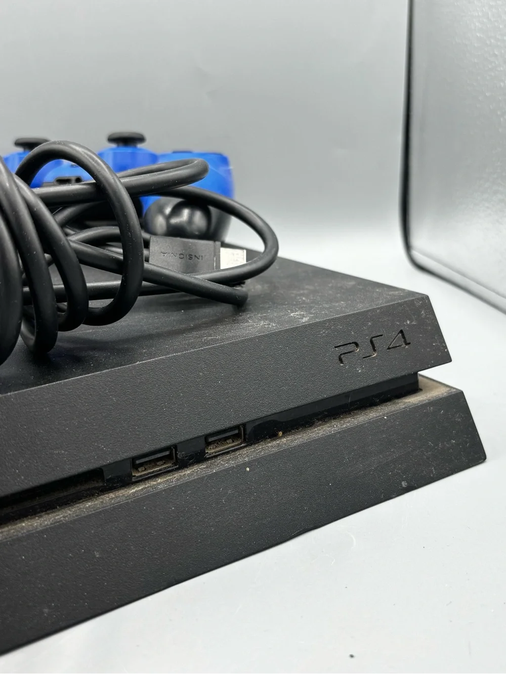 Sony PS4 Slim with Blue and Camouflage DualShock Controllers